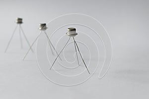 Transistors stand on legs.