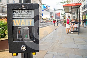 transit stop switch for pedestrian passage.  Electronic system controlled pedestrian treadmill.  London