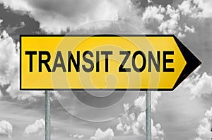 Transit zone traffic sign with black and white cloudy sky