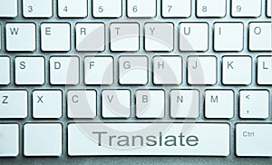 Translate button on computer keyboard. Online translation service photo