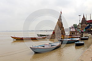 Translation: The scenery of Varanasi`s ghats by the Ganges photo