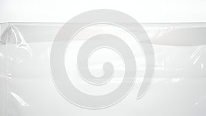 Translucent plastic film with light reflections on white