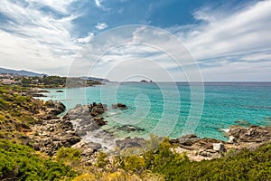 Translucent sea and rocky coastline of Corsica near Ile Rousse