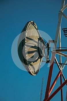 Transmission antenna dish in a telecommunication tower