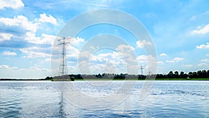 Transmission Lines crossing the Veluwemeer Lake supported by large Transmission Towers