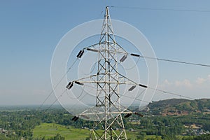 Transmission tower connecting remote villages for 24 hour electricity supply