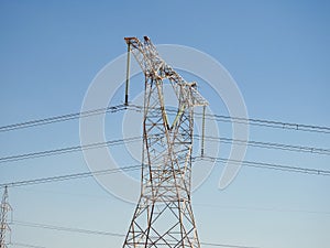 A transmission tower, electricity pylon which is a tall steel lattice structure that used to support overhead high voltage power