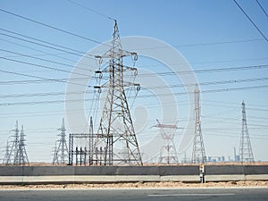 A transmission tower, electricity pylon which is a tall steel lattice structure that used to support overhead high voltage power