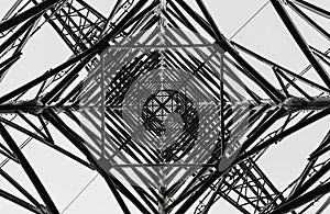 Transmission tower stands a backdrop of a sky