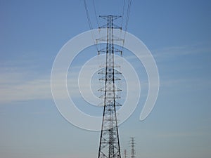 Transmission towers with blue sky