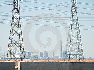 transmission towers, electricity pylon, a tall steel lattice structure to support overhead high voltage power lines, high voltage