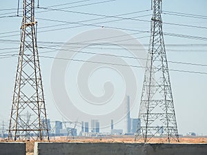 transmission towers, electricity pylon, a tall steel lattice structure to support overhead high voltage power lines, high voltage