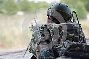 Transmitter radio operator gunner M249 light machine gun