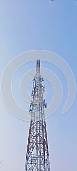 The transmitting tower stands towering into the sky