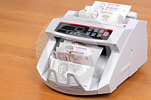 Transnistrian money in a counting machine photo