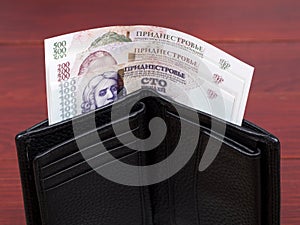 Transnistrian ruble in the black wallet photo