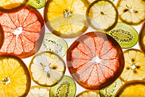 Transparency sliced fruits on white background