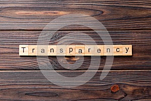 transparency word written on wood block. transparency text on table, concept