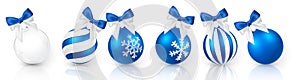 Transparent and Blue Christmas ball with snow effect and blue bow set. Xmas glass ball on white background. Holiday decoration