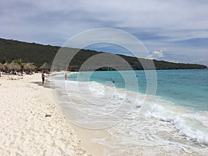 Transparent blue water in the Caribbean sea and beach