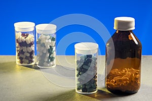 transparent bottle with medicine capsules