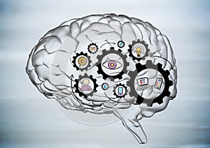 Transparent brain with black gear graphics against blurry grey wood panel