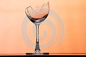 Transparent broken wineglass