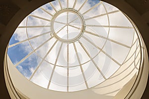 Transparent circular glass ceiling or roof. Close-up fragment of architecture with round structure