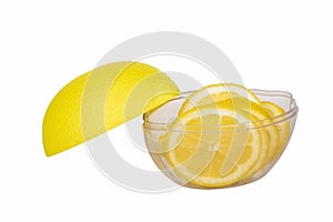 Transparent container for lemon and a sliced lemon inside