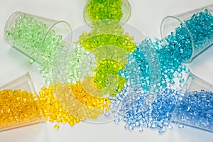 Transparent dyed plastic granulates