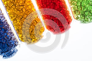 Transparent dyed plastic granulates