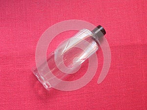 Transparent empty shower gel bottle