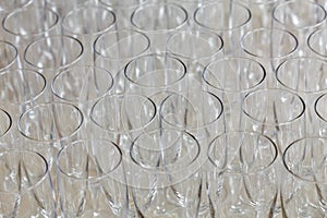 Transparent empty wine chalices glasses. banqueting buffet. photo