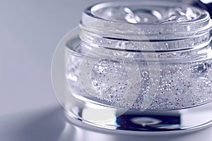 Transparent gel with multicolored microbeads, in round jar, perfect for beauty products, skincare ads, and modern photo