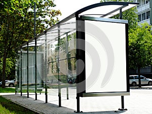 transparent glass bus shelter with white as panel copy space