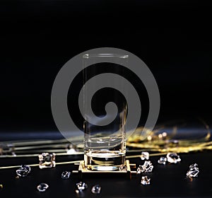 Transparent glass cup on black background