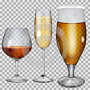 Transparent glass goblets with cognac, champagne and beer