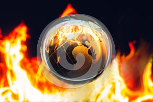 Transparent global on fire inside, Global warming conservative c