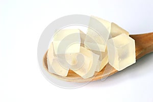 Transparent glycerin soap bases on white background photo
