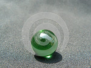 Transparent and green glass Marble