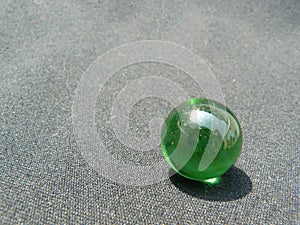 Transparent and green glass Marble