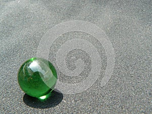 Transparent and green glass Marble