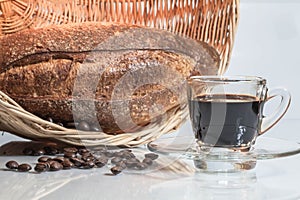 transparent hot coffee cup and bread in white blackground