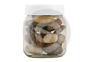 Transparent jar with different stones