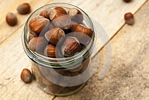 Transparent jar full of hazelnuts