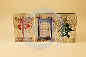 Transparent large red, white and green dragon mahjong tile