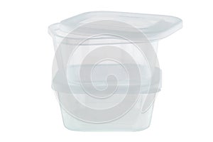 Transparent plastic food storage containers isolated on white ba