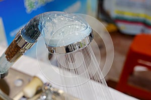 Transparent plastic showerhead spray water