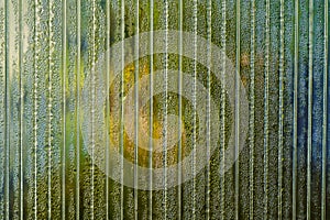 Transparent polycarbonate sheet with morning dew drops. Abstract background