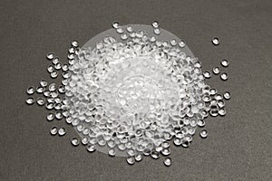 Transparent Polyethylene granules on dark .HDPE Plastic pellets. Plastic Raw material . IDPE.